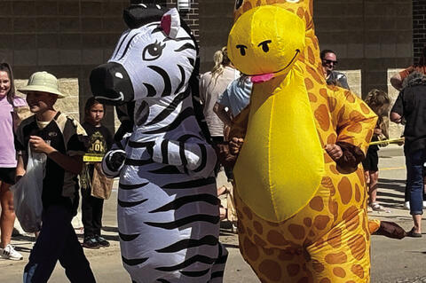 National Geographic wild animals made an appearance at the Homecoming parade.