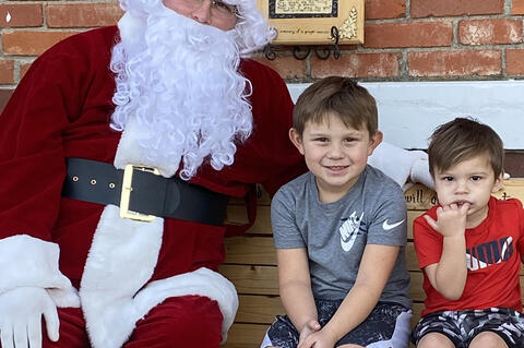 Cade and Carter Lindsey took a turn talking to Santa and giving him their wish lists.