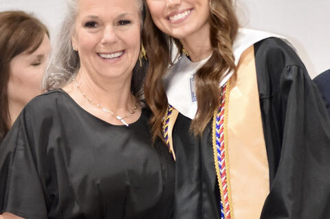 Addison Prentice was presented her diploma by her grandmother School Board Member Dottie Kinig