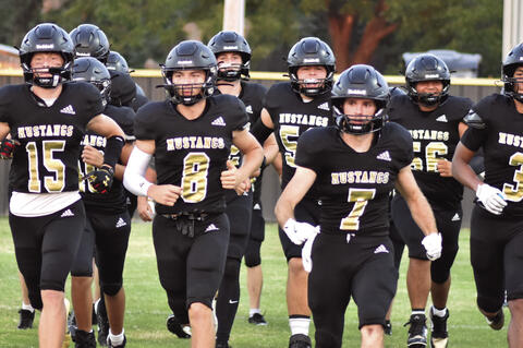 The Mustangs will hope to defend home field Friday night.