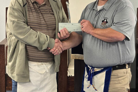 Josh Britt of the Allen Masonic Lodge presented a check on Monday, December 1st to Rick Guyton for family medical and final expenses.