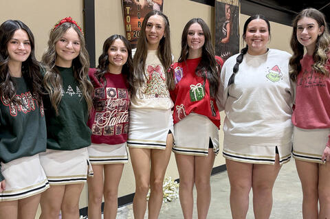 The Allen cheerleaders donned their festive Christmas sweathirts for Tuesday nights game against Stratford. (l-r) Caityn Williams, Lauren Lawler, Jessalynn Jack, Emma Tomb, Grasyn Whitehead, Kendelynn Vivier and Jaiden Lindsey