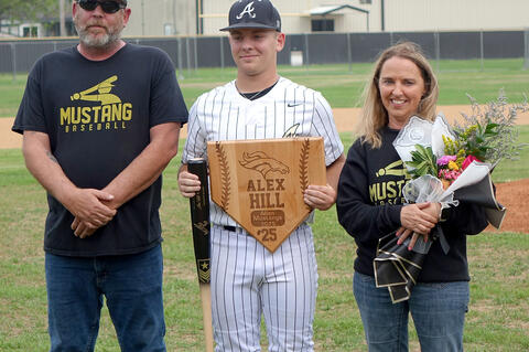 Senior Alex Hill with his parents Andy and Joni Hill.