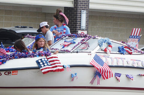 Lacey Tinsley and her family showed their patriotism in the parade.