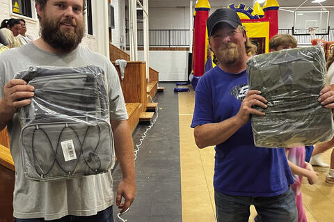A heavily contested cornhole tournament at the Zombie Run was won by the team Scooby
