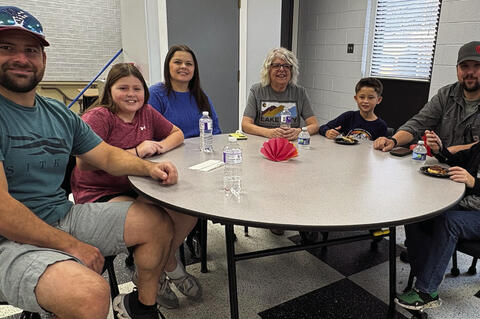 Melissa Harrington got to join her family for Thanksgiving lunch, l-r Adam , Addison and April Burris, Melissa, Nash, Taylor Ross and Parker