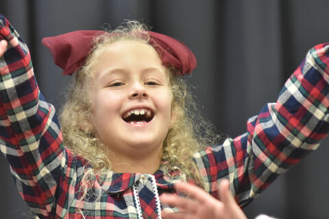 Kennedy Weger singing the grand finale of her class’ program at the Christmas program.