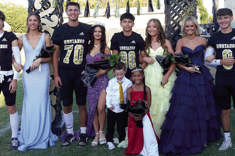Homecoming Royalty 2025 - seniors Ethan Smith and Emma Tomb; sophomores Nate Boeck and queen Caityn Williams; freshmen Mario Gonzalez and Kolbi Clark; and juniors Tresley Mowdy and Briar Heck. Pictured front are crownbearer Lincoln Griffith and flowergirl Jazzy Boolin.