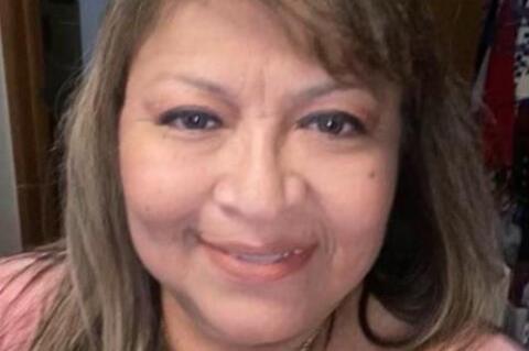 Rites held for Debra Wisdom