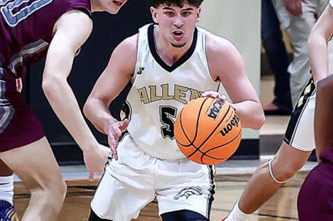 Allen senior Gavin Hamilton and the Mustangs brought home the Regional Tournament trophy Saturday. They will face Caddo Friday in the area tournament. Loaded Lens Photography