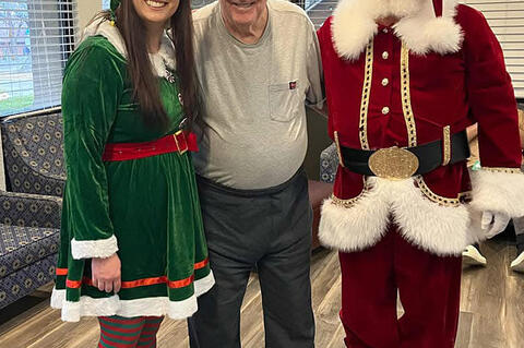 Santa loves children of all ages and he and his elf enjoyed visiting at the Ballard Nursing Home, Ada, with Wesley “Nub” Rinehart recently. Nub had been honored December 2nd with a party celebrating his 81st birthday. Over 40 people, family and friend