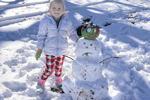 It’s never too cold to play in the snow and make a two-headed snowman – just ask Kolli Russell!