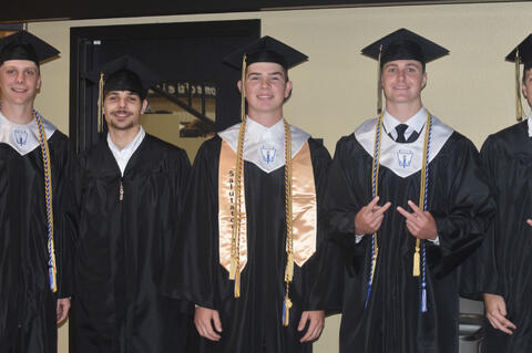 Cooper Newberry, Kaden Sampson, Curt Carlos, Quintin Box and Chris Denbow before graduation