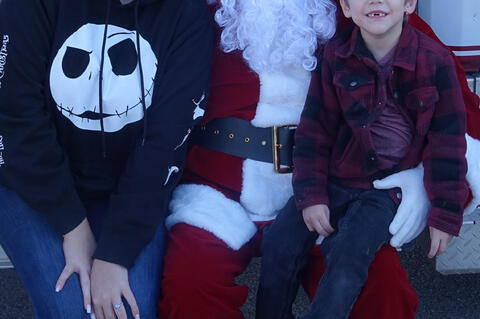 You’re never too young to sit on Santa’s knee. Brooke Grey and her son Oliver shared a turn visiting with Santa.