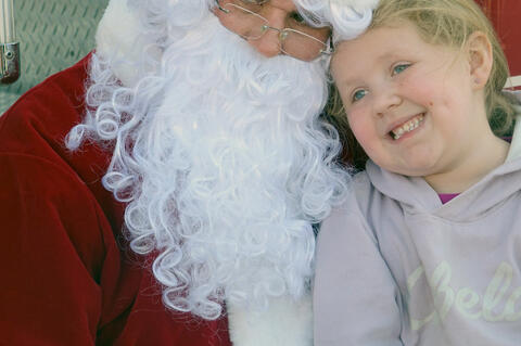 Santa always enjoys his visits with Bree Bell and as you can see she loves him too.