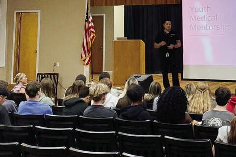Dr Brandon Postoak presents to the Allen students in part of the Youth Medical Mentorship program. Postoak is a graduate of Alllen and wanted to be sure and let students in small school realize they can achieve a career in healthcare.