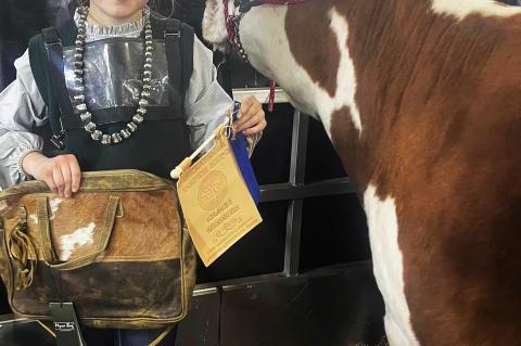 Maebree Howard and her hiefer Fionna