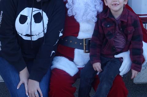 You’re never too young to sit on Santa’s knee. Brooke Grey and her son Oliver shared a turn visiting with Santa.