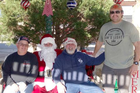 The Allen firemen have the hook up to get Santa to town every year. Mike Lawler and Leon Moore (seated with Santa) have been his driver for many years. This year they decided to let Jesse Rinehart join in the fun. Jimmy Wilson also helped byt wasn’t ava