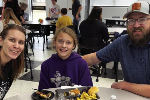 The Hoskins family Erin, Kaydee and Hoot at the Allen Thanksgiving feast.