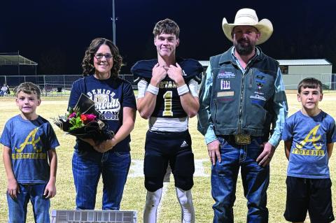 Ethan Smith with his parents Candice and Bryan and his brothers