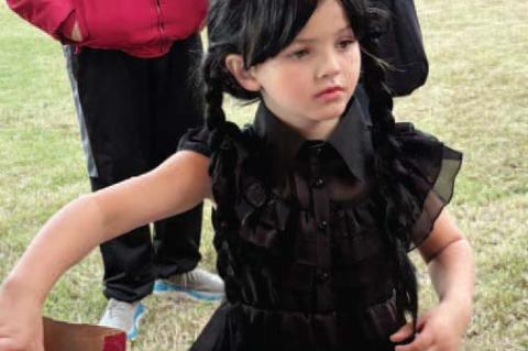 Kambree Bailey in her best Wednesday Adams costume stop[ed by for a drink