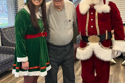 Santa loves children of all ages and he and his elf enjoyed visiting at the Ballard Nursing Home, Ada, with Wesley “Nub” Rinehart recently. Nub had been honored December 2nd with a party celebrating his 81st birthday. Over 40 people, family and friend