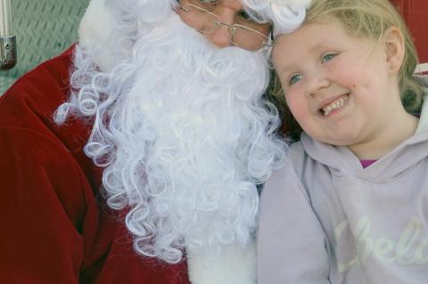 Santa always enjoys his visits with Bree Bell and as you can see she loves him too.