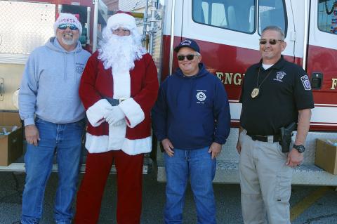 Santa always feels safe in Allen with his security crew of Leon Moore, Mike Lawler and Chief Darrell Armstrong. Not pictured Jimmy Wilson